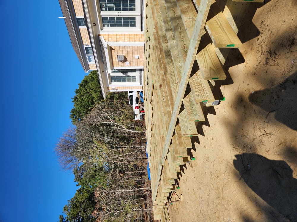 Deck construction with exposed framing